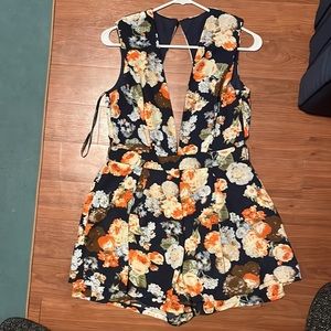 Deep v neck romper peep hole back